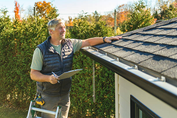 Professional Hail Damage Roof Repair technician working in Absaraka, ND